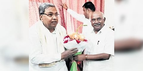 BJP MLC AH Vishwanath greets CLP leader Siddaramaiah on Tuesday