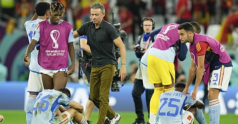 Spain's head coach Luis Enrique, (C), and players react after their loss to Morocco in the World Cup round of 16 fixture at the Education City Stadium in Al Rayyan, Dec. 6, 2022. (Photo | AP)