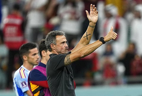 Spain's head coach Luis Enrique reacts to supporters at the end of the World Cup round of 16 soccer match between Morocco and Spain, at the Education City Stadium in Al Rayyan, Qatar. (Photo | AP)