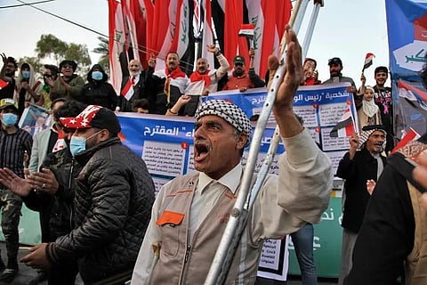 Protesters chant slogans in Tahrir Square during anti-government demonstrations in Baghdad, Iraq, Dec. 26, 2019. Hayder al-Zaidi, an Iraqi activist, was sentenced, Dec. 5, 2022. (Photo | AP)