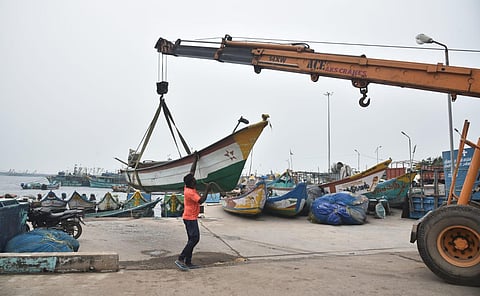 Fisherman shifting their boats to safer places at kasimedu fishing harbour while Cyclone Mandous going to hit Chennai coast on Thursday. (Photo | P Jawahar, EPS)
