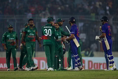 Indian captain Rohit Sharma, second right congratulates Bangladesh players who won the second one day international cricket match between Bangladesh and India (Photo | AP)