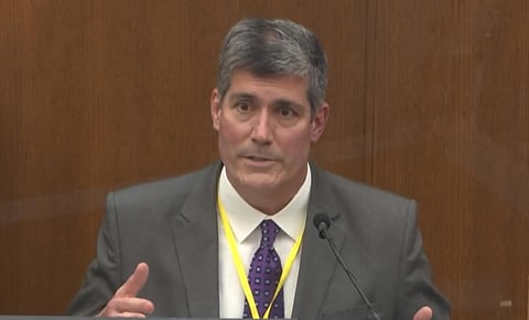 Dr. Andrew Baker, Hennepin County Medical Examiner, testifies in the trial of former Minneapolis police Officer Derek Chauvin. (Photo | AP)