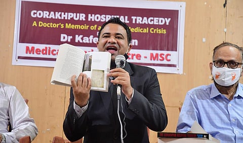 Dr Kafeel Khan releasing his book on the Gorakhpur hospital tragedy in Bengaluru on Monday. (Photo | Shriram BN, EPS)
