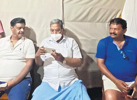 CLP leader Siddaramaiah (centre) relaxes with HC Mahadevappa and  HP Manjunath at a resort in the Kabini backwaters on Monday