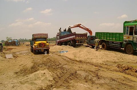 Lifting sand from Subarnarekha river bed illegally. (Photo | EPS)
