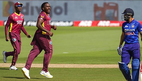 West Indies' Odean Smith, second left, celebrates the wicket of India's Virat Kohli, right, during the second ODI between India and West Indies in Ahmedabad. (Photo | AP)
