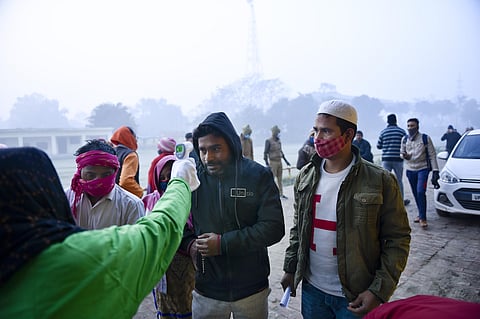 People at a polling station to cast their votes during the voting for the first phase of Uttar Pradesh elections at Muradnagar, Uttar Pradesh,Thursday, Feb. 10, 2022. (Photo | PTI)