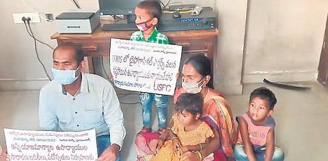 G Jangaiah, along with wife and three children, protests at Chikkadpally police when they were taken into preventive custody on Wednesday morning
