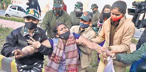 AISA activists taken away by police during a protest over the hijab controversy at Karnataka Bhawan. (Photo | Shekhar Yadav)