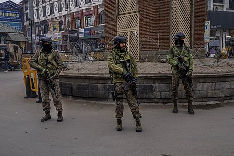 Indian paramilitary soldiers stand guard during a surprise check operation in Srinagar. (File photo | AP)