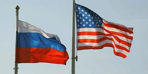Russia Flag (L) and US Flag (File Photo | Reuters)