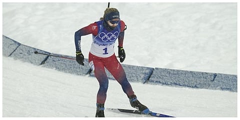 Marte Olsbu Roeiseland of Norway skis during the women's 10-kilometer pursuit race at the 2022 Winter Olympics on Sunday. (Photo: AP)