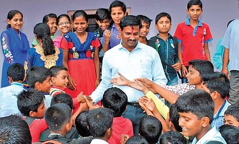 Ramesh Ballid has addressed close to 4.85 lakh students, teachers and parents across rural Karnataka and also the country | Express