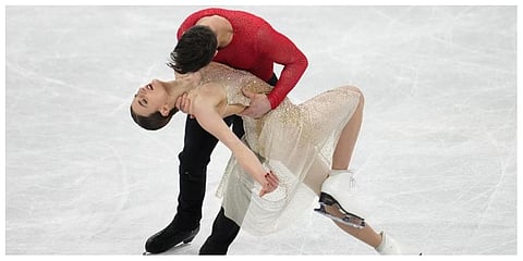 Gabriella Papadakis and Guillaume Cizeron, of France, perform their routine in the ice dance competition during the figure skating at the 2022 Winter Olympics on Monday in Beijing. (Photo: AP)