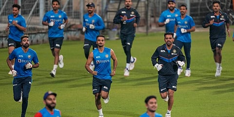 Indian players warm up during a practice session ahead of the first T20I match against West Indies in Kolkata, India, Monday, Feb. 14, 2022. (Photo | AP)