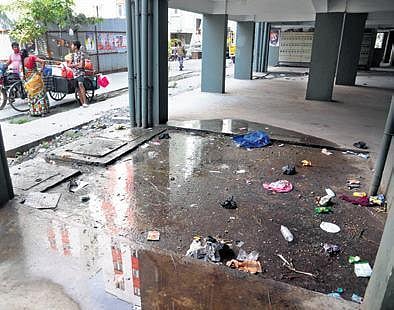 Garbage and broken bottles on the premises of KP Park | R Satish Babu