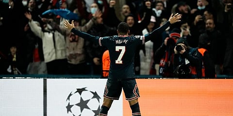 PSG's Kylian Mbappe celebrates after scoring his side's opening goal during the Champions League, round of 16, first leg game against Real Madrid in Paris, Feb 15, 2022. (Photo | AP)