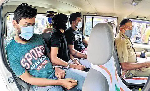 The accused being taken to the police station  |  Albin Mathew