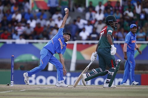 Ravi Bishnoi (L) delivers a ball. (Photo | AFP)