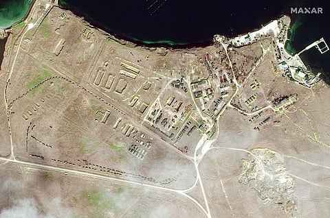 This Feb. 15, 2022 satellite image provided by Maxar Technologies shows military equipment positioned in convoy at Lake Donuzlav in Crimea. (Photo | AP)