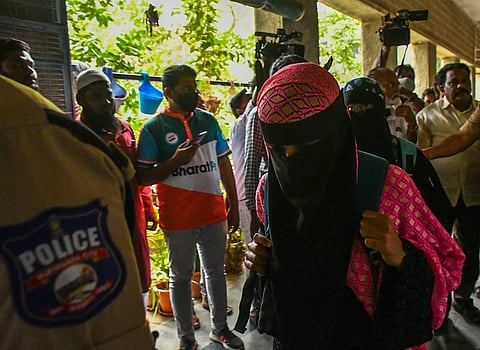 The girls were accompanied by police to their classrooms after they were allegedly stopped for wearing hijab and burqa at Loyola College in Vijayawada on Thursday (Express Photo | Prasant Madugula)