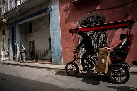Not exactly teeming with activity is this Cuban street. (Photo | AP)