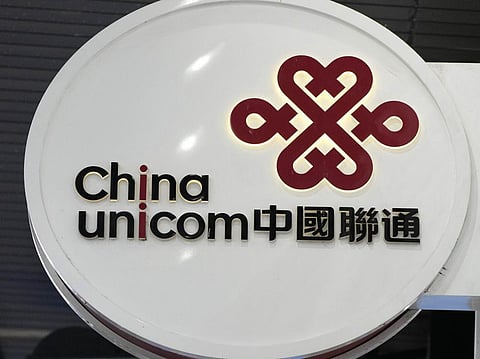 China Unicom Limited logo is displayed at a shop in Hong Kong, Nov. 18, 2021. (Photo | AP)