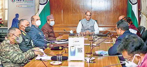 Defence minister Rajnath Singh reviews the preparations of Defexpo on Friday. (Photo | PTI)