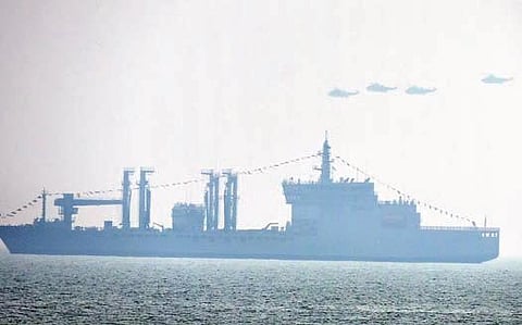 Naval ships rehearsing days ahead of the Presidential Fleet Review, off the  RK Beach coast in Visakhapatnam on Friday I G Satyanarayana