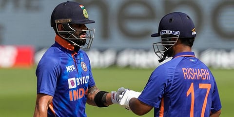 India's Virat Kohli, left greets Rishabh Pant who hit a four during their second one day international match against West Indies in Ahmedabad, India, Feb. 9, 2022. (Photo | AP)