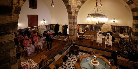 Patrons sit in a public bathhouse in Damascus, Syria, Saturday, Jan. 22, 2022. (Photo | AP)