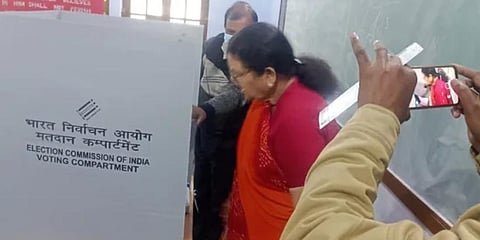 Kanpur Mayor Pramila Pandey shared pictures of her pressing EVM button of BJP's Lotus symbol. (Photo | Twitter)