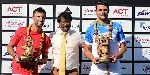 Aleksandar Vukic, right, with his Bengaluru Open trophy at the presentation ceremony.