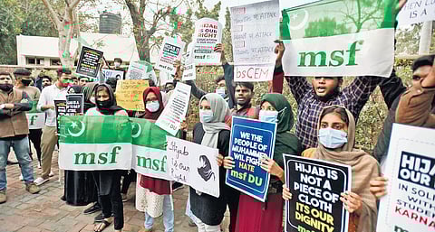 Delhi University students let their opinion be known during a protest over the hijab controversy (Photo | EPS, Shekhar Yadav)