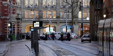 Police gather outside the Apple Store in Amsterdam after the end of a hostage situation. (Photo| AP)