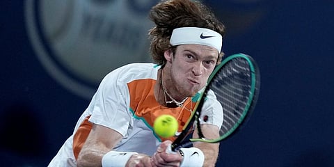 Andrey Rublev returns the ball to Daniel Evans during a match at the Dubai Duty Free Tennis Championship in Dubai, UAE. (Photo | AP)