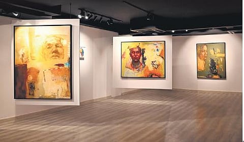 A few mixed media paintings on canvas from the portrait series showcased at Usha Phenany Pathak’s solo exhibition ‘Gold Mines’