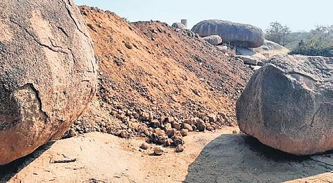 The rock formations at Khajaguda that are methodically being covered with soil. (Photo | EPS)