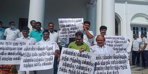 Opposition MLAs walking out of the Puducherry Assembly hall, Feb 23, 2022. (Photo | EPS)