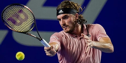 Stefanos Tsitsipas hits a forehand to Laslo Djere at the Mexican Open tennis tournament in Acapulco, Mexico. (Photo | AP)