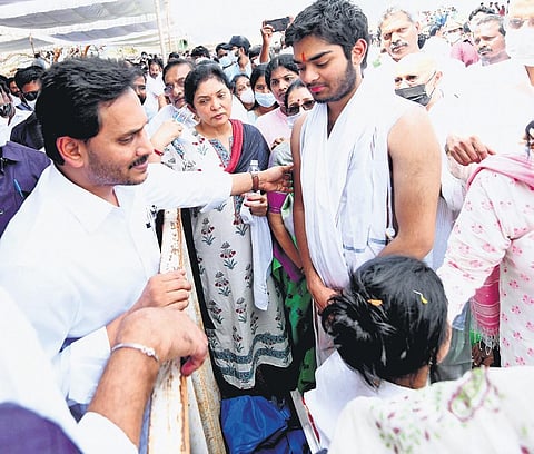 Chief Minister YS Jagan Mohan Reddy consoles the son of Mekapati Gowtham Reddy at Udayagiri in Nellore district on Wednesday. (Photo | EPS)