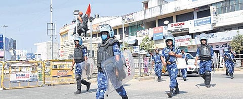 RAF personnel take out a route march in Shivamogga town on Tuesday. (Photo | EPS, Vinod Kumar)