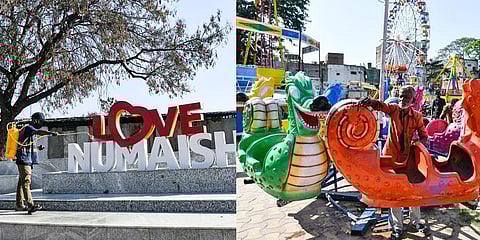 Workers spray stalls at Numaish with disinfectant, in Hyderabad, on Thursday. (Photo | Vinay Madapu, EPS)