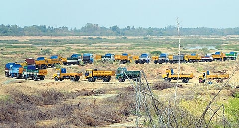 File photo of lorries at a river sand quarry   | Express