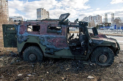 A damaged and burnt military vehicle is seen after fighting in Kharkiv, Ukraine, Sunday, Feb. 27, 2022. (Photo | AP)