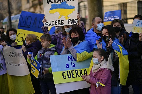 People gather to protest in Pamplona, northern Spain, Monday, Feb. 28, 2022, after the Russian invasion of Ukraine. (Photo | AP)