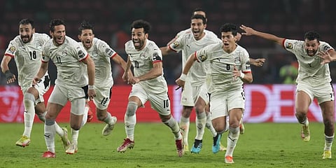 Egypt's Mohamed Salah, center, and teammates celebrate during the African Cup of Nations 2022 semifinal soccer match between Cameroon and Egypt.(Photo | AP)