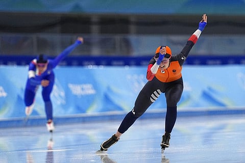 Irene Schouten of the Netherlands, right, competes against Francesca Lollobrigida of Italy in the women's speedskating 3,000-meter race at the 2022 Winter Olympics. (Photo | AP)