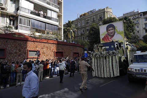The body of Lata Mangeshkar, is taken for funeral procession outside her house in Mumbai, India, Sunday, Feb.6, 2022. (Photo | AP)